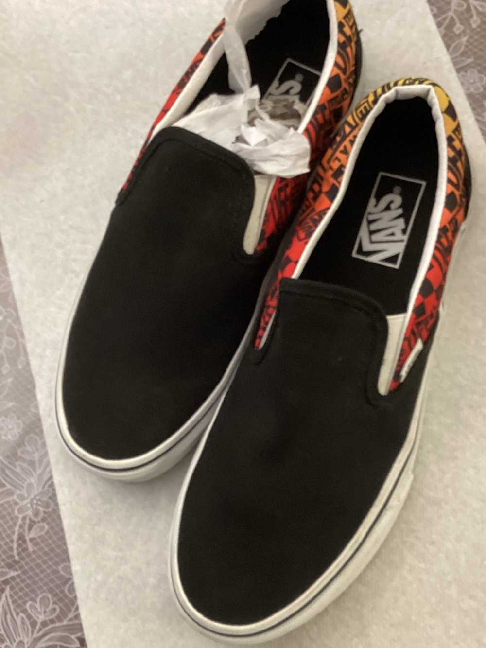 Vans Black Slip-On Loafers with Red and Orange Patterned Collar